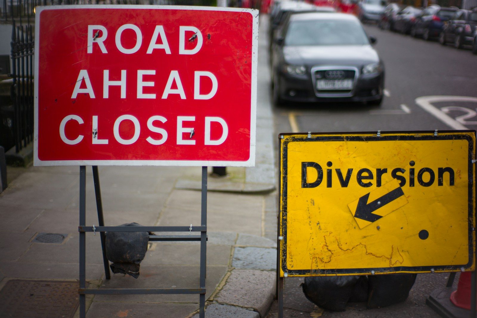 Rpad Closed Ahead and Diversion Sign